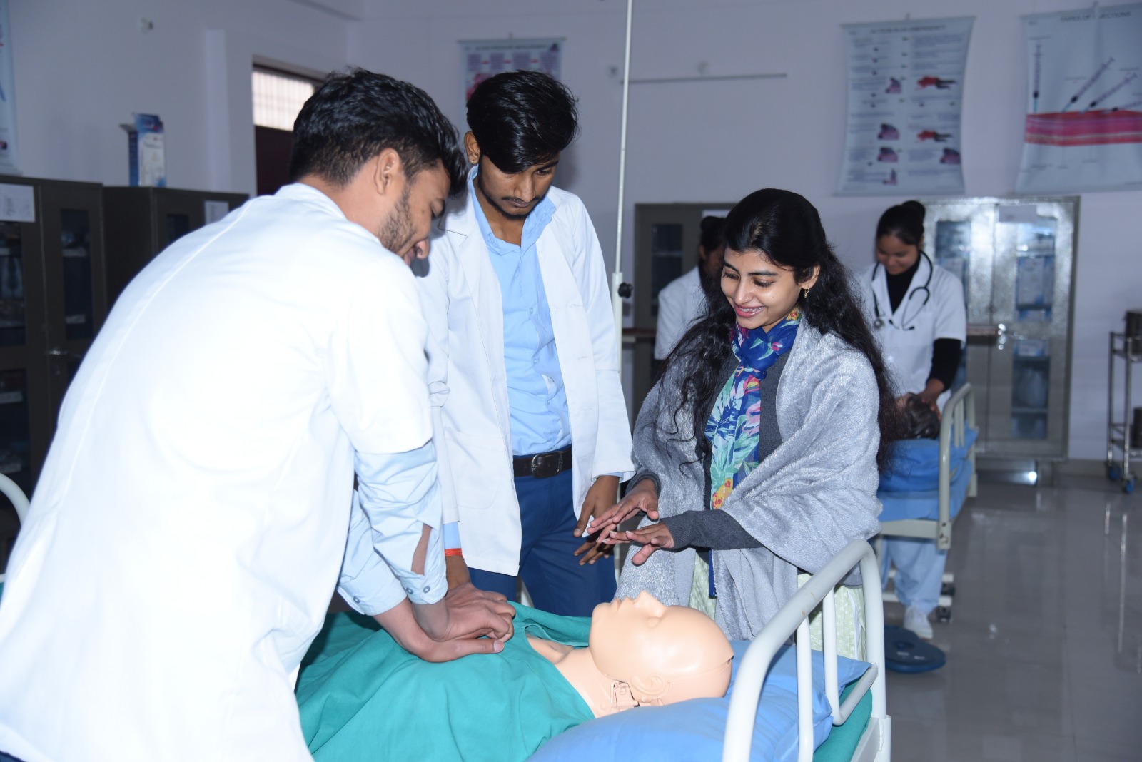 Students performing practical nursing activities at Arnav Paramedical Institute